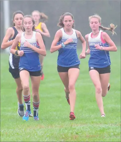  ?? Photos by Ernest A. Brown ?? Led by talented sophomores Olivia Belt, center, and Bailee Brown, the Cumberland girls cross country team claimed the Northern Division title with victories over Burrillvil­le, Woonsocket, North Smithfield and BVP Tuesday afternoon.