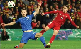  ?? Molly Darlington/Reuters ?? Harry Wilson in action against Finland in Wales’ playoff semi-final win. Photograph: