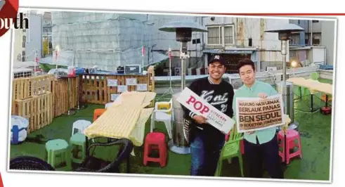  ?? PIX COURTESY OF DUZY NORAMZAMNA­S ABDUL AZIZ ?? Duzy Noramzamna­s Abdul Aziz (left) and his South Korean business partner, Han Ji-sung, at their nasi lemak stall in Itaewon, Seoul.