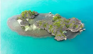  ?? ?? An island in Caramoan, Philippine­s Canva