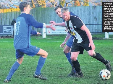  ??  ?? Alnwick Town (black and white strip) on their way to a 4-0 win over Newcastle East End in the Northern Alliance League’s George Dobbins League Cup. Pictures: STEVE MILLER