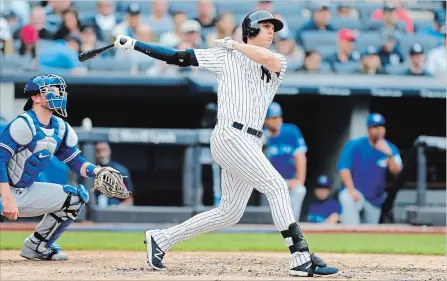  ?? NOAH MURRAY THE ASSOCIATED PRESS ?? New York Yankees’ Greg Bird follows through on his grand slam in the first inning Sunday.