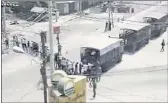  ?? FILE — THE ASSOCIATED PRESS ?? In this image from video, soldiers line up arrested protesters in Yangon, Myanmar.