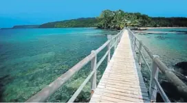  ??  ?? UNSPOILT BEAUTY: Mark Shuttlewor­th, and a view of Bom Bom, in Príncipe, which he plans to develop into a major tourist attraction