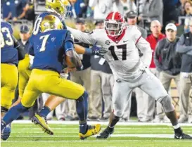  ?? PERRY MCINTYRE/GEORGIA PHOTO ?? Georgia senior outside linebacker Davin Bellamy believes his 8-0 Bulldogs will handle the added hype of the college football playoff rankings, which will be revealed for the first time this season tonight.