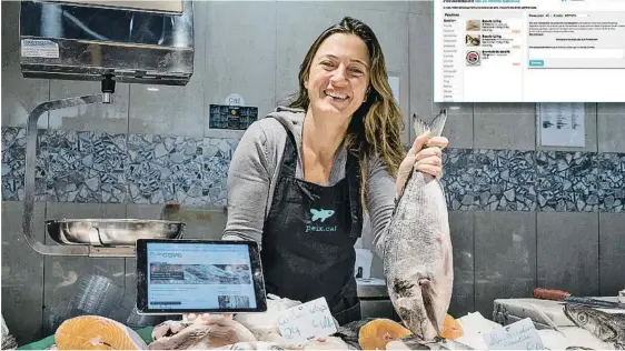  ?? DANI CODINA ?? Lluïsa Ripoll mantiene su parada en la Boqueria y vende pescado en línea en el portal Peix al Cove