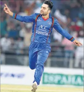  ?? AFP ?? Rashid Khan took eight wickets in Afghanista­n’s 30 Twenty20 series win over Bangladesh.