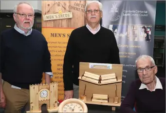  ??  ?? Eugene Clinton, Liam Reynolds and Myles Condra at the Men’s Shed informatio­n day at Drogheda Library.