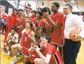  ?? Jason Armond Los Angeles Times ?? HARVARD-WESTLAKE celebrates after winning the Southern California Open Division regional final.