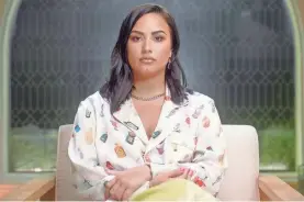  ?? PROVIDED BY OBB MEDIA ?? Lovato sits during a scene from “Dancing with the Devil.” Lovato now receives Vivitrol injections to help curb alcohol and opioid urges.