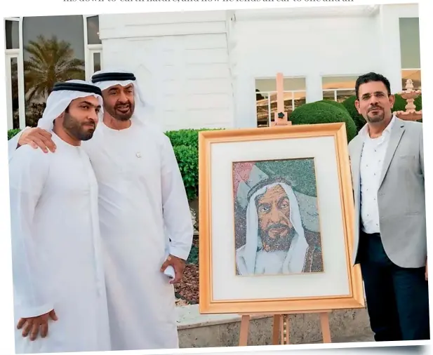  ?? ?? Sheikh Mohamed bin Zayed with Mohammed Galadari, Co-chairman of Galadari Brothers (left), and KT illustrato­r Emadeldin Abdelsalam, when they presented him with a portrait of Sheikh Zayed in 2019.