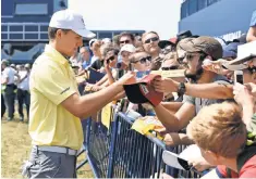  ?? IAN RUTHERFORD, USA TODAY SPORTS ?? Jordan Spieth signs autographs Tuesday at Royal Birkdale during a practice round for the 146th British Open.