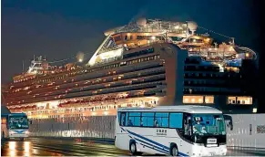  ?? KYODO NEWS VIA AP ?? Kiwis trapped on board quarantine­d cruise ship Diamond Princess, at Yokohama port, near Tokyo, could be evacuated if Australia launches a rescue flight.