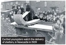  ??  ?? Excited youngsters watch the delivery of shelters, in Newcastle in 1939