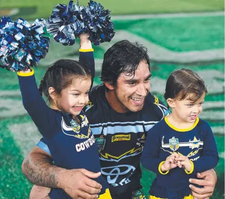  ?? Picture: GETTY IMAGES ?? Johnathan Thurston with two of his biggest fans, daughters Frankie and Charlie, at his Townsville farewell.