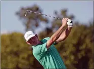  ?? DAVID J. PHILLIP — THE ASSOCIATED PRESS ?? Brandt Snedeker hits his tee shot on the 11th hole during the first round of the Houston Open golf tournament Thursday, in Houston.