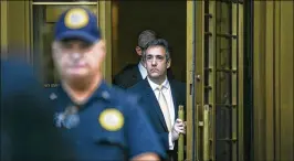  ?? JEENAH MOON / THE NEW YORK TIMES ?? Michael Cohen, President Donald Trump’s personal lawyer, pleaded guilty to campaign finance violations and implicated Trump in the crimes.