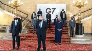  ??  ?? Britain’s Prime Minister Boris Johnson (centre) and Britain’s Foreign Secretary Dominic Raab (second left), with other delegates during the G7 foreign ministers meeting in London on Wednesday.