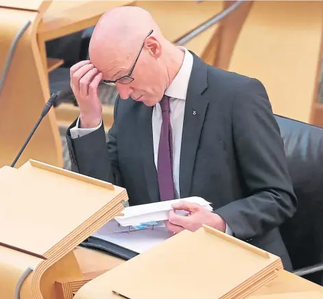  ??  ?? UNDER PRESSURE: Newly released documents give an insight into the extent of the anger of parents and pupils unleashed on Deputy First Minister John Swinney, pictured, on exam results day.