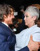  ?? Valérie Macon/AFP/Getty Images ?? An exuberant physical display … Tom Cruise and Jamie Lee Curtis. Photograph: