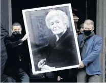  ?? PHOTO: GETTY IMAGES ?? Influentia­l . . . Mourners carry a portrait of Irina Antonova, in front of her coffin, during a funeral at the Pushkin State Museum of Fine Arts in Moscow.