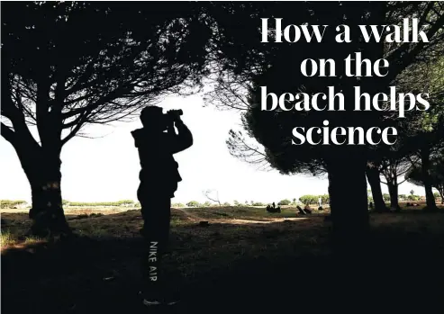  ?? NAME THAT LBJ Picture: Esa Alexander ?? Aadam Abdullah, 17, focuses on a bird during a visit to Rondebosch common in Cape Town. He is a keen user of the BirdLasser app.