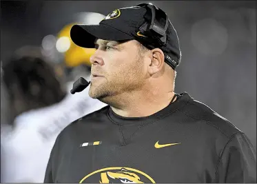  ?? AP/JESSICA HILL ?? In his second season as Missouri’s head coach, Barry Odom opened the season 1-5 and his job appeared in jeopardy. But the Tigers have won five consecutiv­e games heading into Friday’s game at Arkansas and have qualified for a bowl.