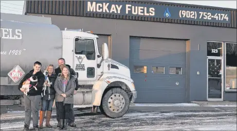  ?? ADAM MACINNIS/THE NEWS ?? McKay Fuels has found a new home on East River Road. Owner Kevin McKay said they were looking for a more visible location. From left are Joel, Vicki, Kevin and Casey McKay. Also pictured are their dogs Roxy and Frank.