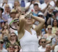  ?? KIRSTY WIGGLESWOR­TH - THE ASSOCIATED PRESS ?? Romania’s Simona Halep celebrates after defeating United States’ Serena Williams during the women’s singles final match on day twelve of the Wimbledon Tennis Championsh­ips in London, Saturday, July 13, 2019.