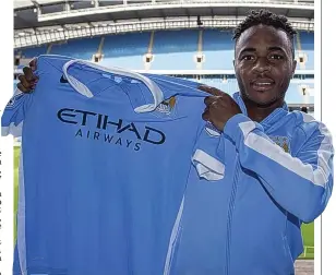  ?? PA ?? Strip show: City’s signing Sterling displays his new blue colours