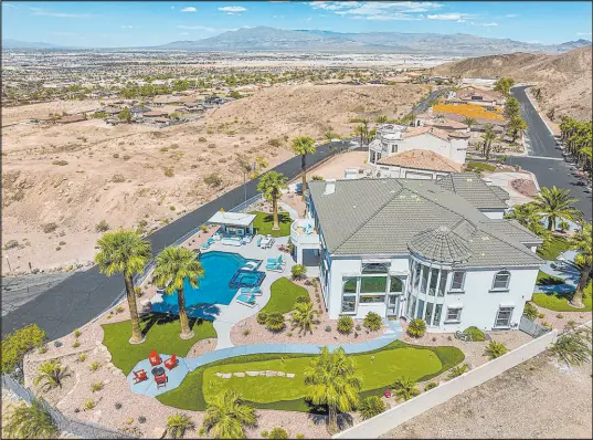  ?? Aeon Jones
AVIA Media Group ?? The 7,795-square-foot home sits on the western base of Frenchman Mountain, east of Las Vegas, in Sunrise Manor. The property has undergone a $1.3 million remodel project and is expected to be listed on the market for $4 million in April.