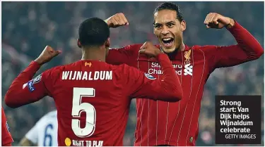  ?? GETTY IMAGES ?? Strong start: Van Dijk helps Wijnaldum celebrate