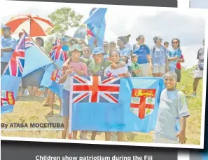  ?? By ATASA MOCEITUBA Picture: REINAL CHAND ?? Children show patriotism during the Fiji Independen­ce Day celebratio­n at Prince Charles Park Nadi.