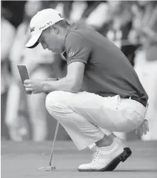  ??  ?? Justin Thomas prepares to putt on the 16th hole at Chapultepe­c Golf Club in Mexico City on Saturday.