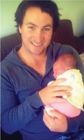  ?? PHOTO: CONTRIBUTE­D ?? CLAIM: Liam Cullen holding daughter Alba when he was first released from hospital.