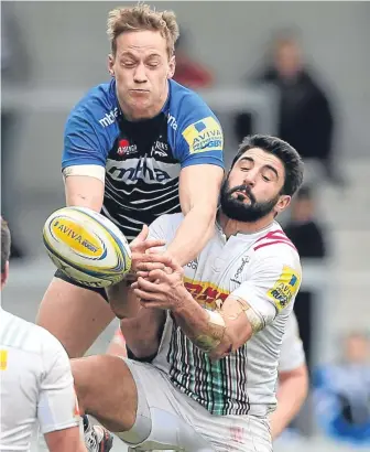  ??  ?? Mike Haley of Sale (left) and Harlequins’ Tito Tebaldi battle for the ball.