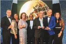  ??  ?? Colm McLoughlin and others at the award ceremony. Dubai Duty Free was in the same category with the likes of Capi, Delhi Duty Free Services, Dufry Internatio­nal and Ever Rich Corporatio­n, among others.