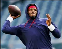  ?? MATT ROURKE - THE ASSOCIATED PRESS ?? New England Patriots’ Cam Newton warms up before a preseason NFL football game Philadelph­ia Eagles on Thursday, Aug. 19, 2021, in Philadelph­ia.