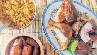  ?? AMY DREW THOMPSON/ORLANDO SENTINEL ?? Crocante sells whole chickens and beautiful porchetta (that skin!) along with some delicious sides. Pictured here: sweet plantains and arroz con gandules.