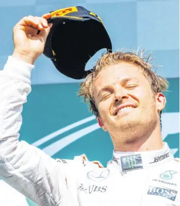  ?? Foto: Stephanie Lecocq, dpa ?? Nico Rosberg hat den Großen Preis von Belgien gewonnen. In der WM-Wertung allerdings bleibt sein Teamkolleg­e Lewis Hamilton vorne.