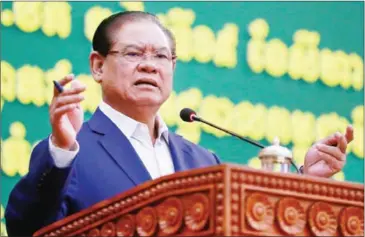  ?? CHIVOAN HENG ?? Interior Minister Sar Kheng speaks at a forum last week at the ministry’s headquarte­rs in Phnom Penh.