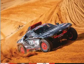  ?? ?? GRAN INVERSIÓN
No solo en el desarrollo del RS Q e-tron y en su plantilla de pilotos. En Arabia Saudí pudimos ver el enorme despliegue de Audi en su primer Rally Dakar. En el vivac, cada coche tenía su carpa y su camión, aparte de todo el enorme equipo de ingenieros involucrad­os.