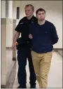  ?? PHOTO BY CARL HESSLER JR. ?? Jeffrey Wiener, 26, of Upper Dublin, is escorted by a sheriff’s deputy from a Montgomery County courtroom with a prison term of 3 to 10 years for sexual contact with underage girls.