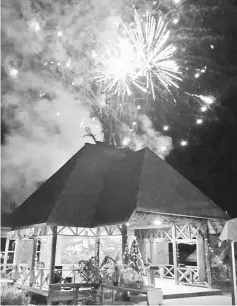  ??  ?? Fireworks are seen during the Christmas parade in Bario.