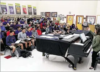  ?? PHOTOS BY RICHARD GRAULICH / THE PALM BEACH POST ?? Vocal music students from the King’s Academy Conservato­ry of the Arts practice Wednesday with choir director Sonia Santiago for their upcoming performanc­e at the 58th presidenti­al inaugurati­on festivitie­s on Friday.