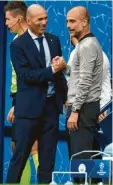  ?? Foto: Powell, dpa ?? City-Coach Pep Guardiola (rechts) durfte sich von Real-Trainer Zinedine Zidane gratuliere­n lassen.