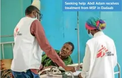  ?? ?? Charlie Kimilu/MSF
Seeking help: Abdi Adam receives treatment from MSF in Dadaab