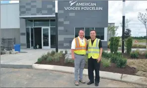  ?? PAUL WELITZKIN / CHINA DAILY ?? Above: Michael Kephart (left), president of American Wonder Porcelain and Jianping Huang, chairman and president of The Wonderful Group, outside of the American Wonder Porcelain plant in Lebanon, Tennessee.