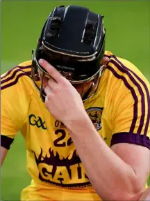  ??  ?? A dejected Darren Codd after Wexford’s heart-breaking defeat in an epic Leinster Under-21 hurling championsh­ip final.