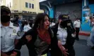  ?? Photograph: Esteban Biba/EPA ?? A demonstrat­or is arrested during clashes between the police and protesters in Guatemala City on Saturday.